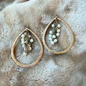 Gold tone teardrop hoops with pearl cluster drop